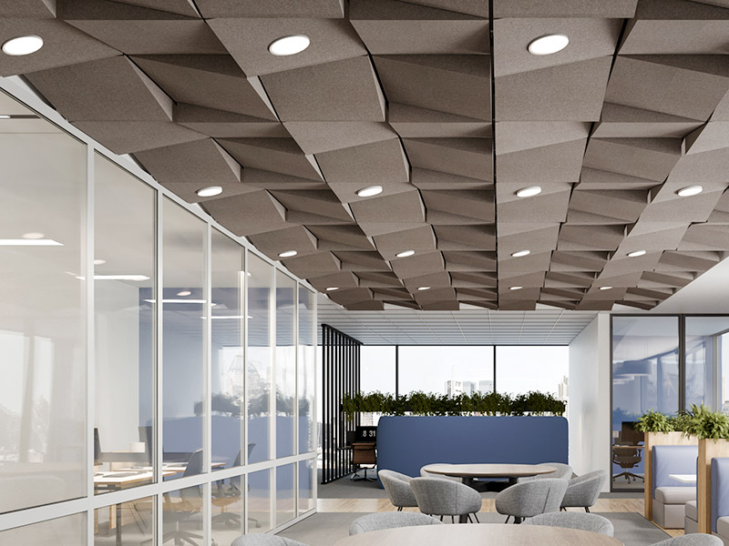 3D faceted acoustic ceiling tiles above open office collaboration area