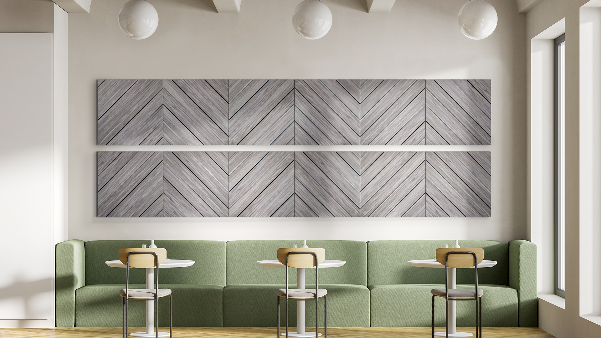 Gray chevron herringbone sound dampening panels above green banquette seating