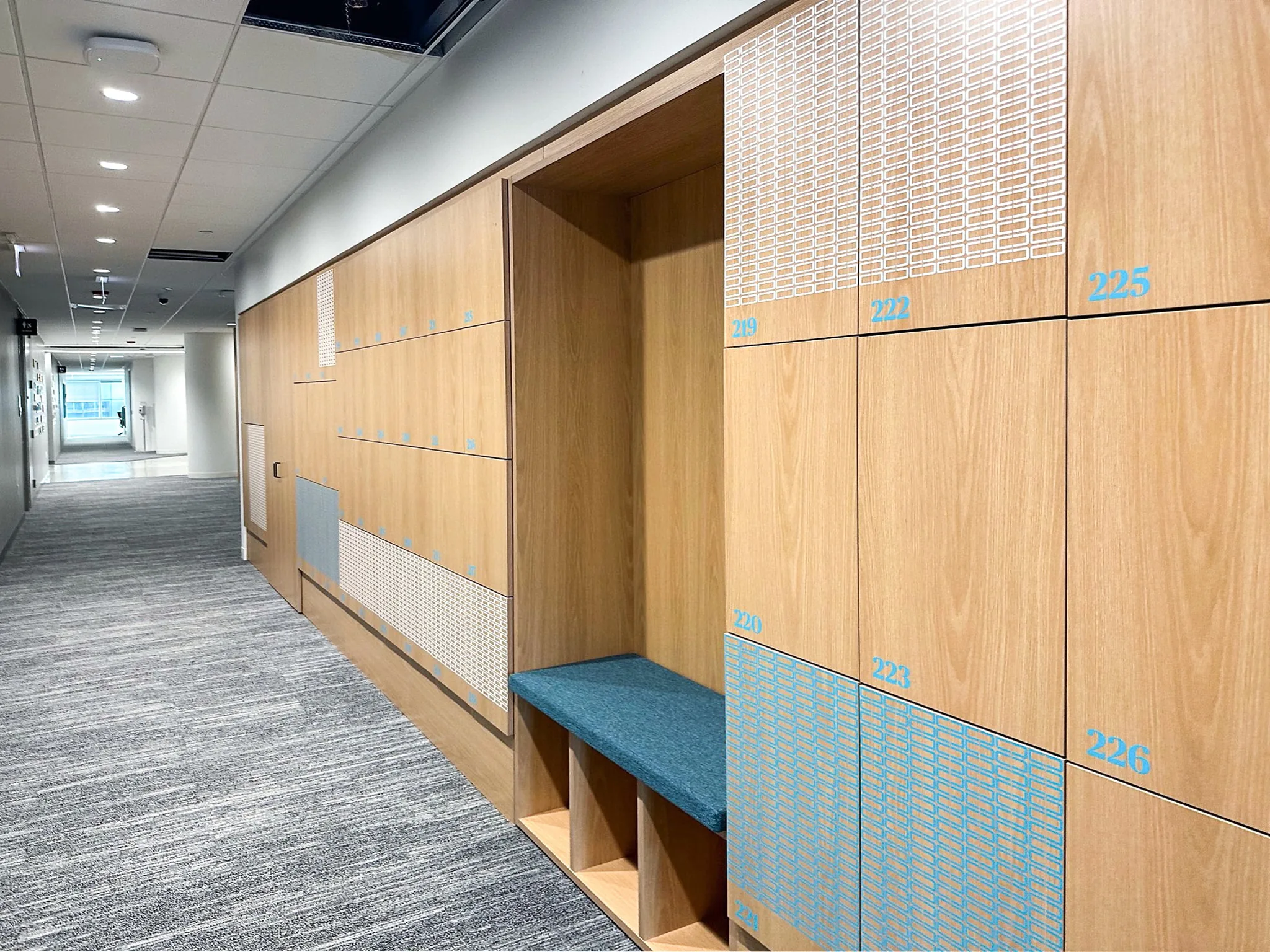 Built-in wall lockers with integrated benching, Chubb Chicago