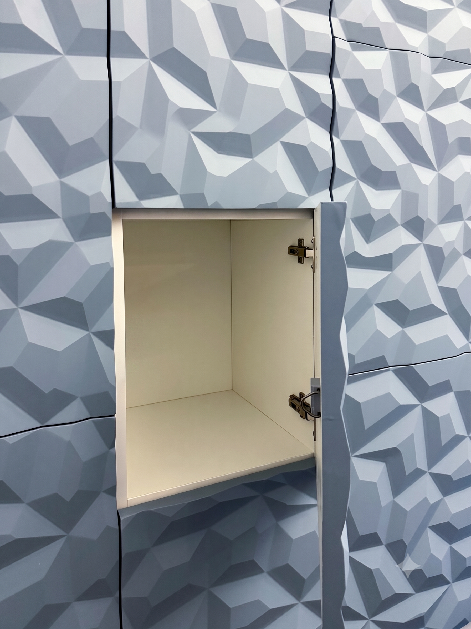 Geo-rock textured locker door shown open, interior visible