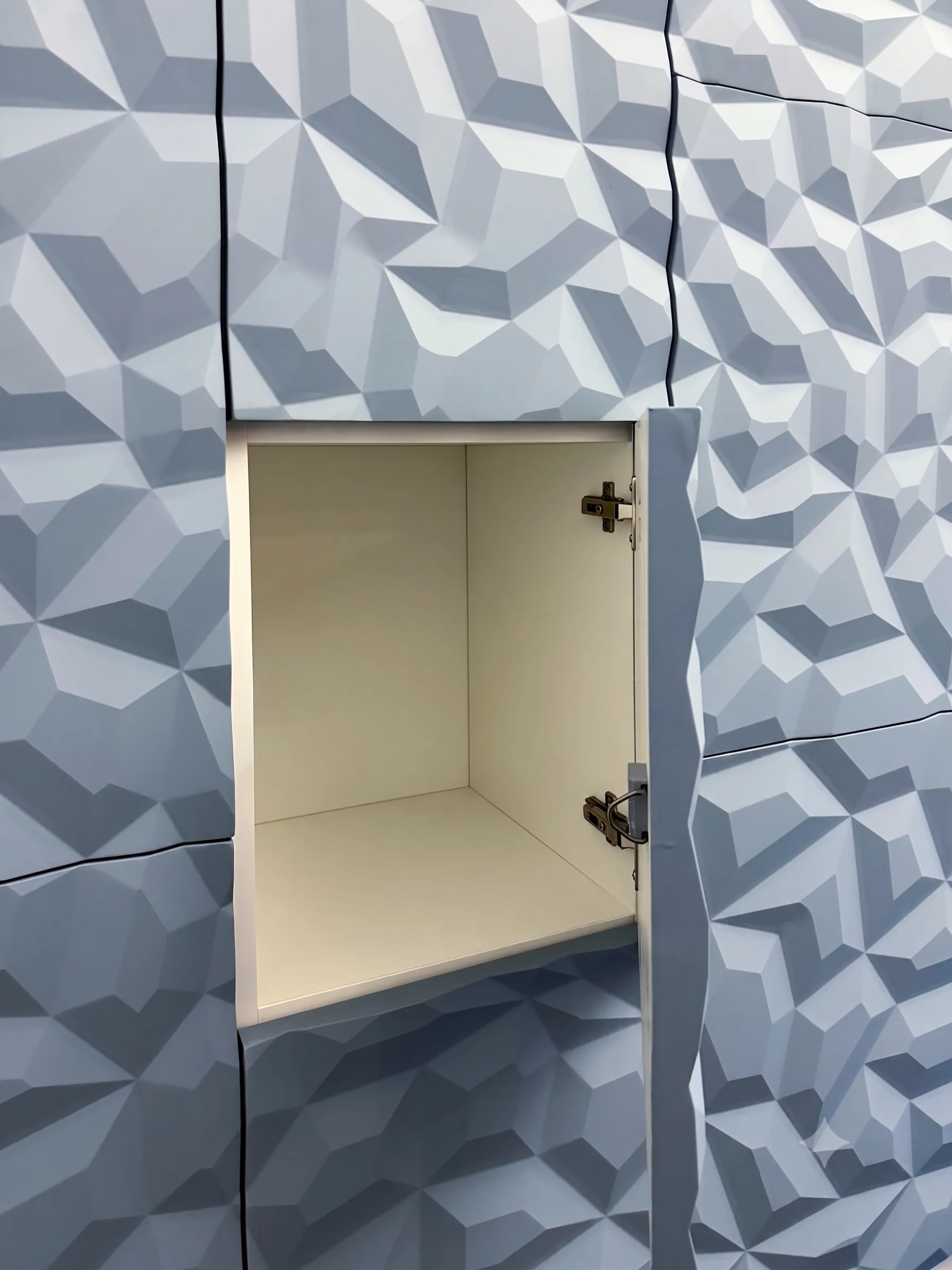 Geo-rock textured locker door shown open, interior visible