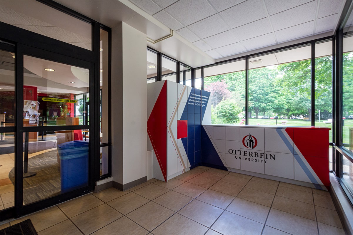 Otterbein University branded vinyl wrap lockers in lobby corner