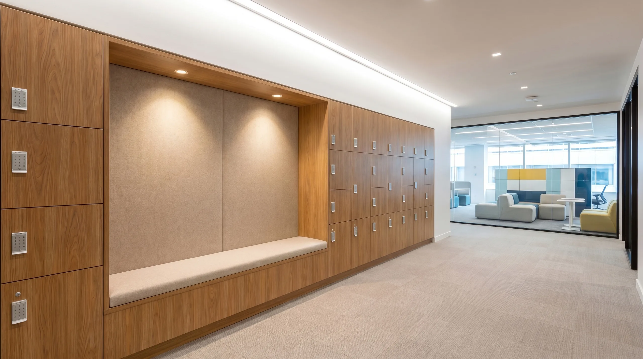 Wood locker wall with seating niche in higher education facility