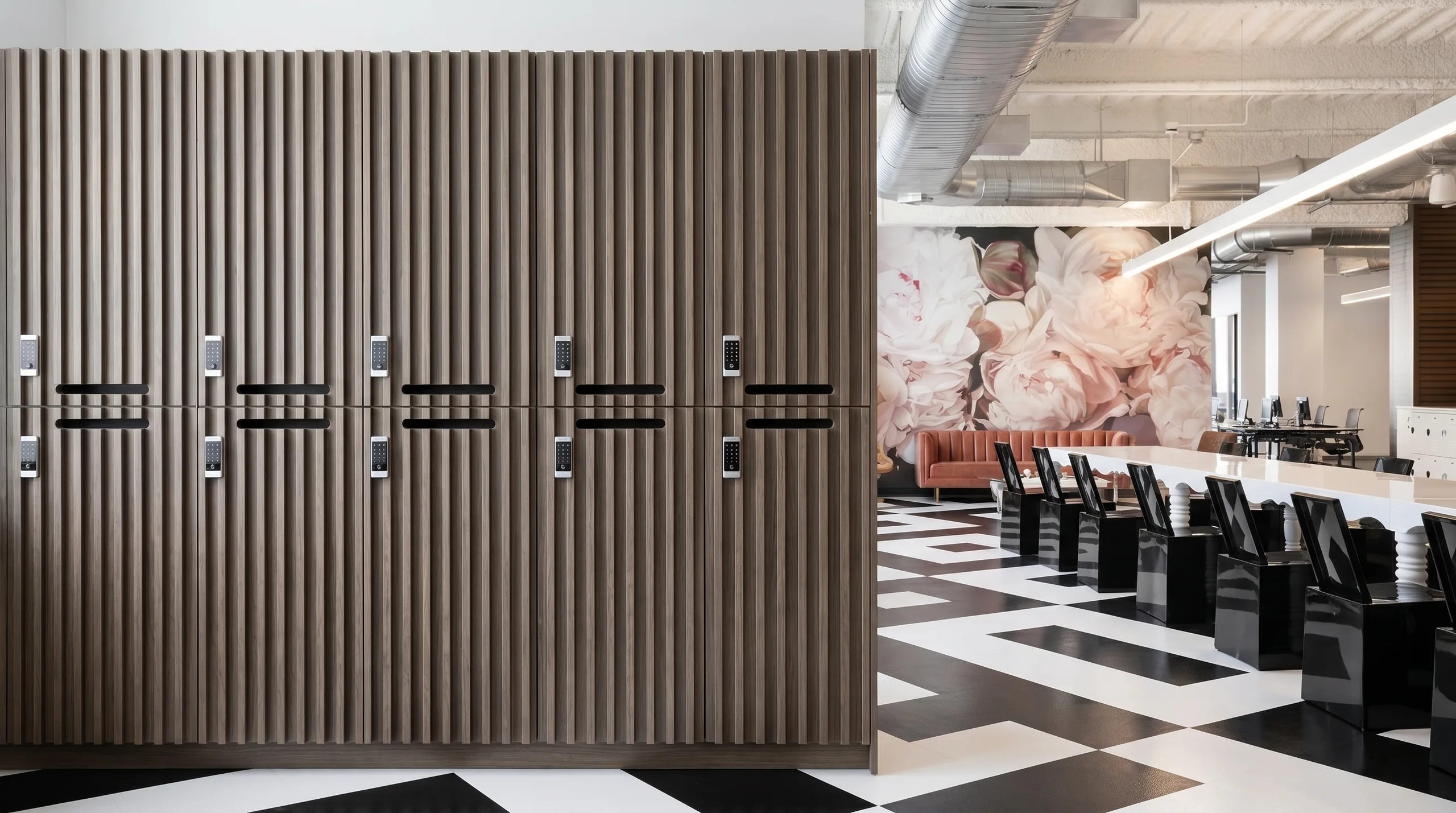 Reeded woodgrain checkerboard locker wall in a media company