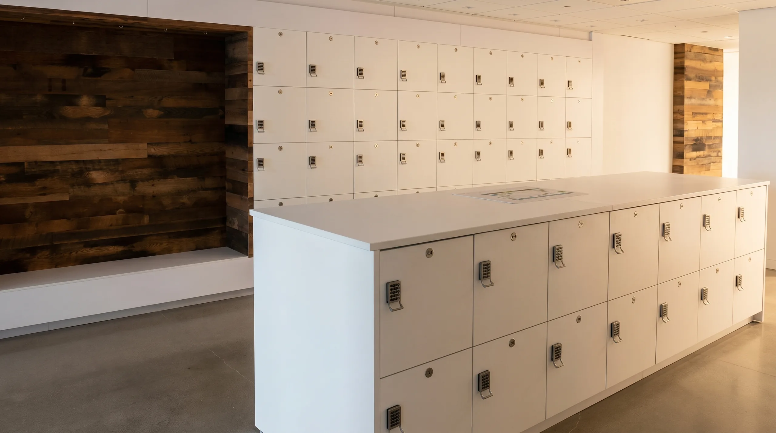 Island with integrated locker doors in agile open workplace