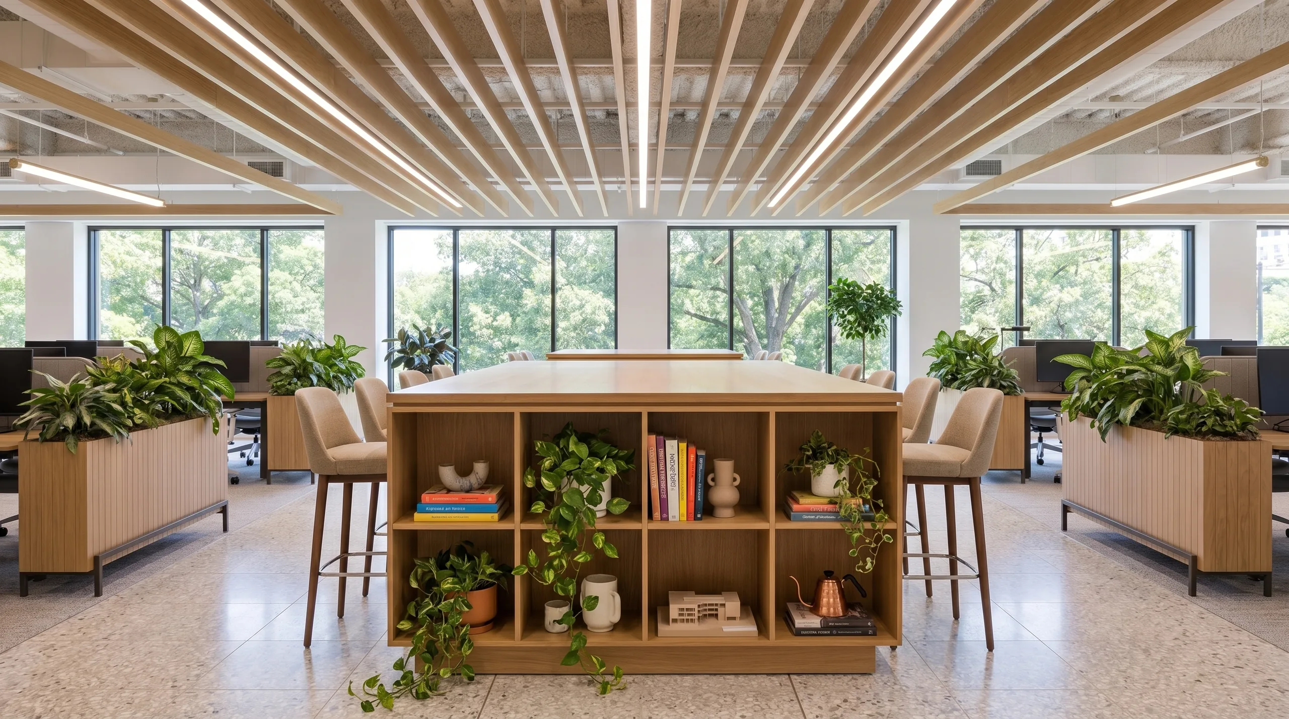 Double-sided collaboration island with open shelving in a biophilic office