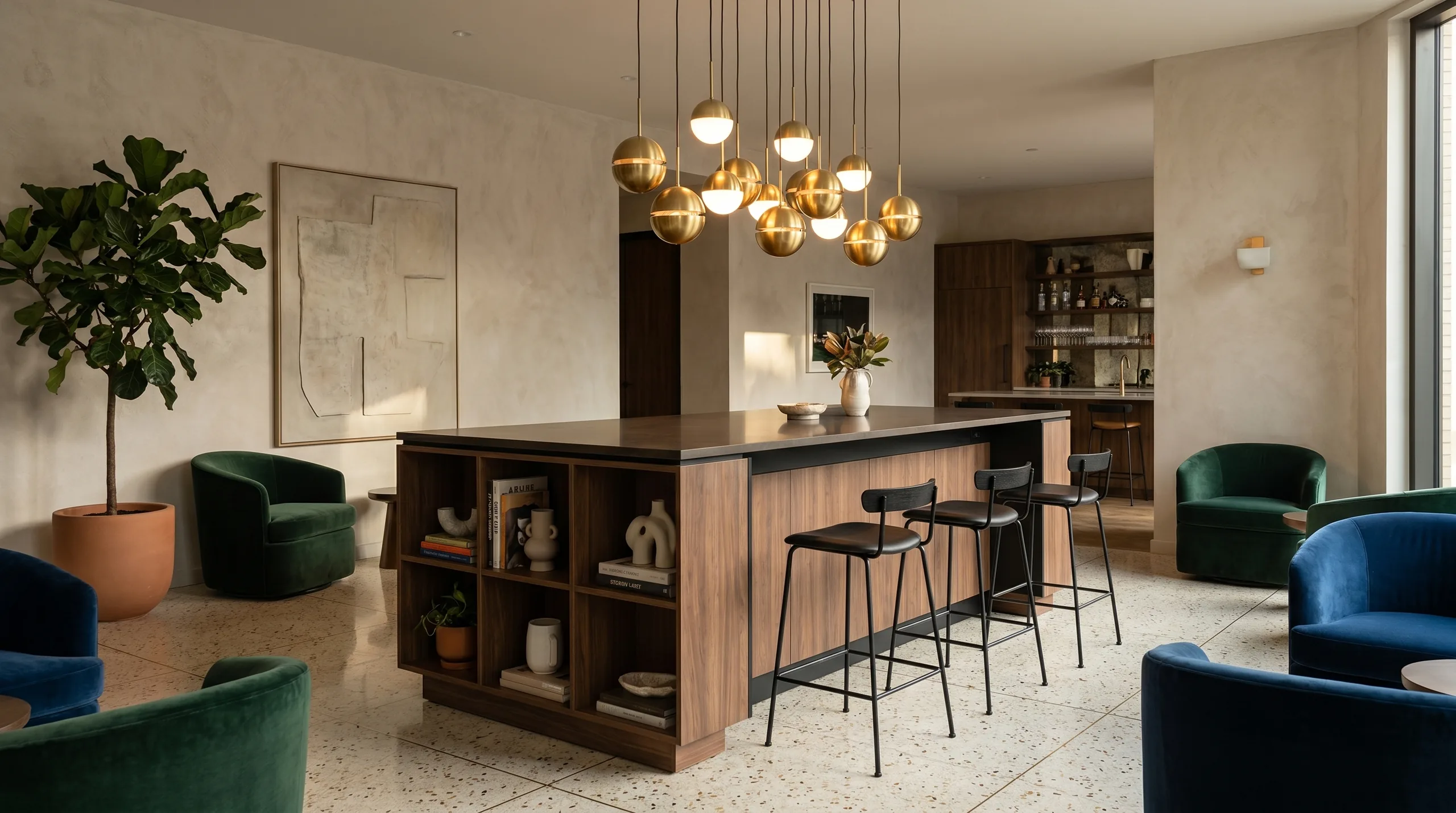 Boutique hotel social lobby island in walnut with globe brass pendant cluster and terrazzo floors