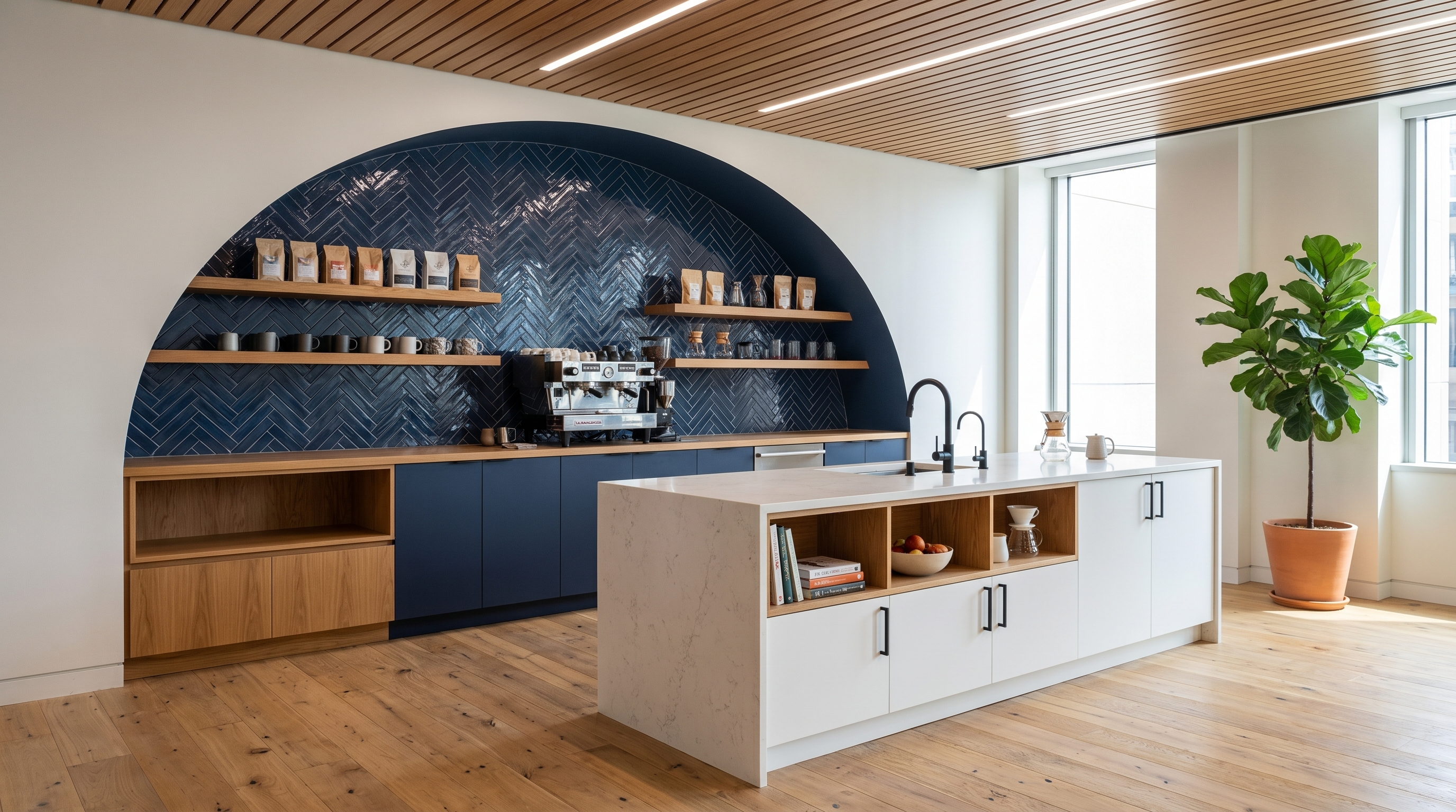 Tech office kitchenette with navy arched niche and herringbone tile