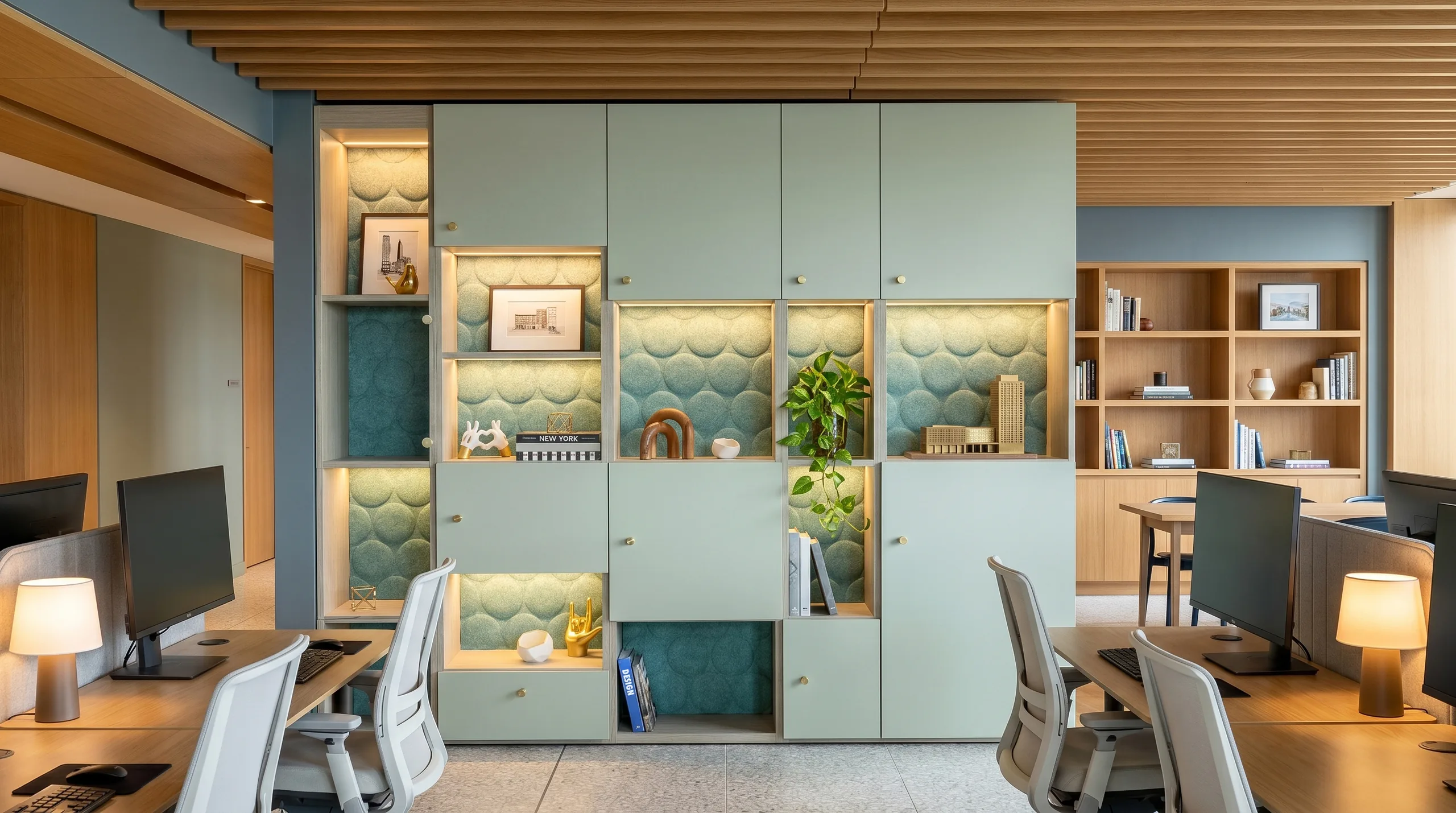 Zone Divider with sage quilted acoustic panels in media agency